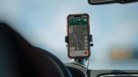  A GPS is positioned for the driver to view as he drives on the highway