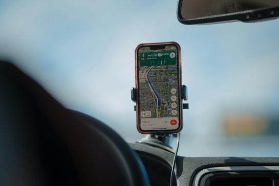  A GPS is positioned for the driver to view as he drives on the highway
